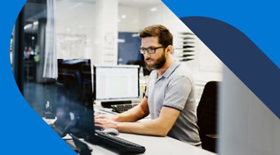 A person working at their desk.