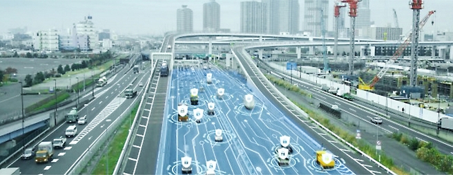 Μια εικόνα ενός αυτοκινητόδρομου με αυτοκίνητα που κινούνται σε αυτόν.