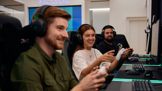 A customer playing Xbox games in the gaming lounge.