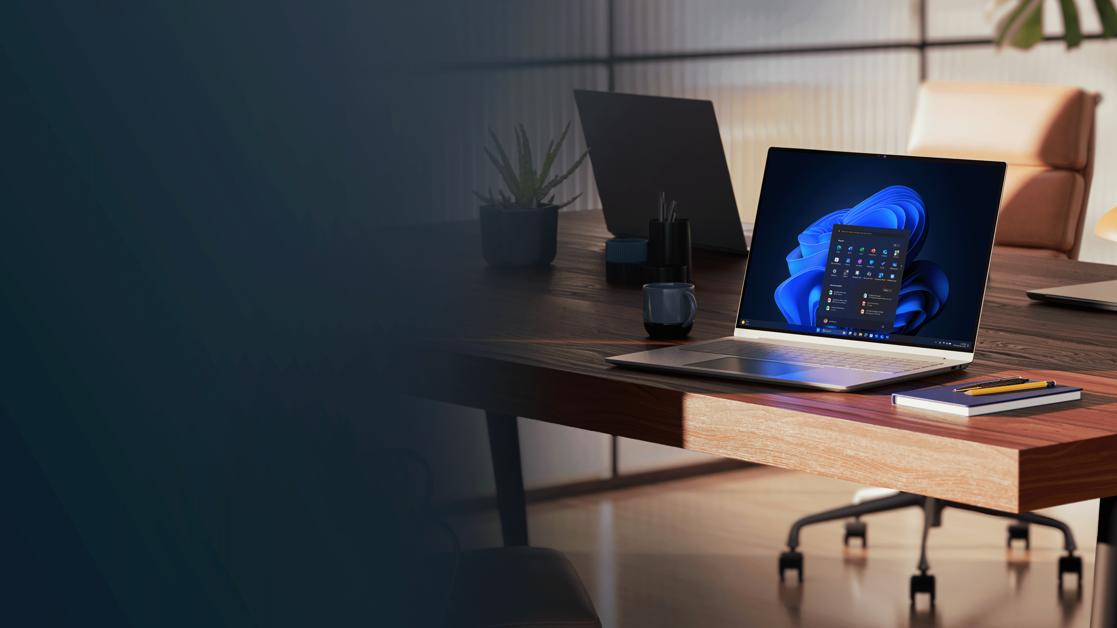 Windows 11 Pro laptop open on a desk