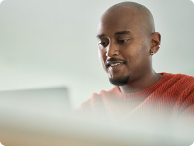 A person looking at a computer screen