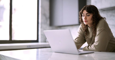 A women working with a laptop.