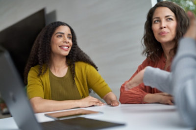 Work colleagues talking.