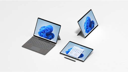 A Surface Pro X propped on kickstand with keyboard attached, a Surface Pro X propped on kickstand, and a Surface Pro X folded back like a tablet with a pen in front