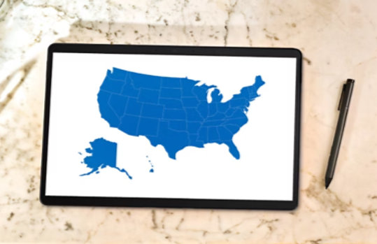 A tablet displaying a map of the United States.