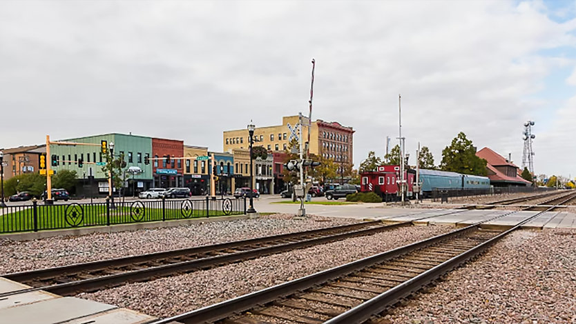 The intersection of Fargo's Broadway Drive and Main Ave., as seen from across the train tracks.