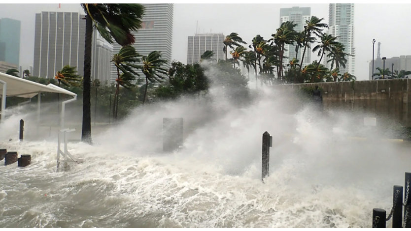 A hurricane striking the shore.