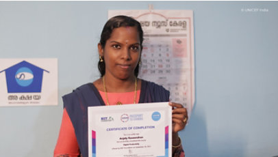 A person holding a certificate of completion for a digital productivity course.