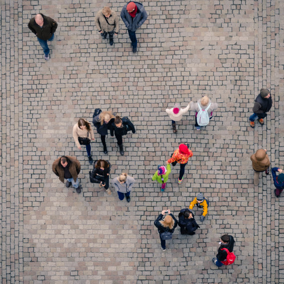 Aerial view of people walking on a street.