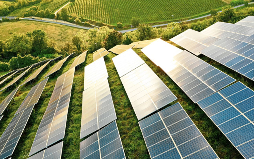 Solar panels fields on green hills.