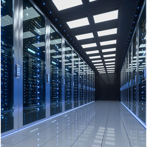 A modern data center filled with illuminated server racks.