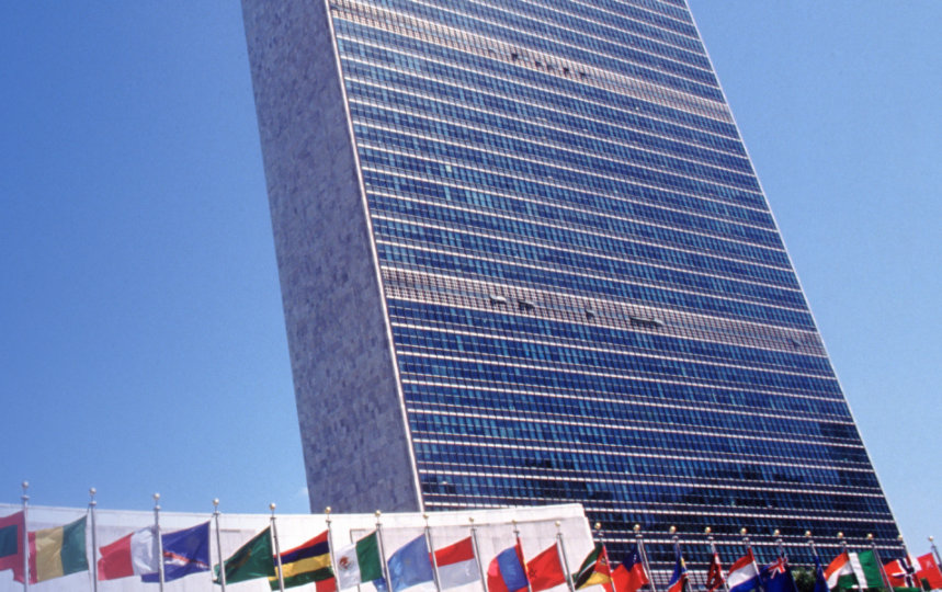 United Nations building with flags