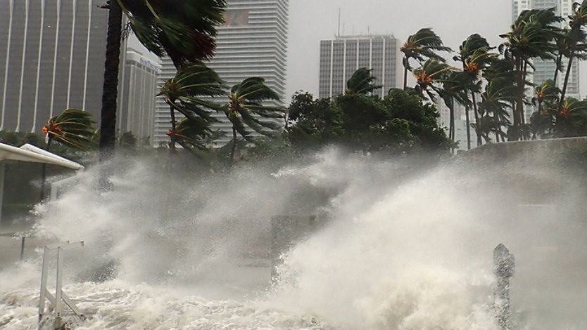 A hurricane striking the shore.