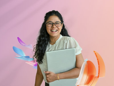 A person holding a computer