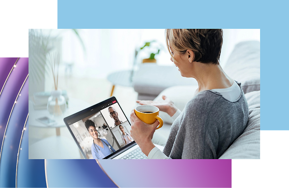 A person holding a cup of coffee and talking in a video call
