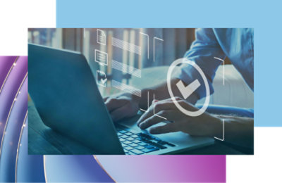 A close-up of a person typing on a computer