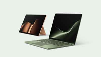 The latest edition Surface PCs—a Surface Laptop in the color Jade and a Surface Pro in the color Dune.