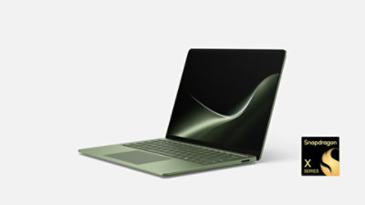 A Surface Laptop 13.8inch 8ed in the color Jade with a Snapdragon badge. 