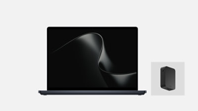 Ein Surface Laptop Ultra in der Farbe Nightfall und ein Surface 140-W-USB-C-Netzteil. 