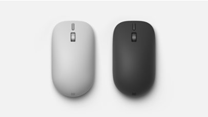 A Surface Mouse (2nd Edition) for Business in the color Platinum and a Surface Mouse (2nd Edition) for Business in the color Black. 