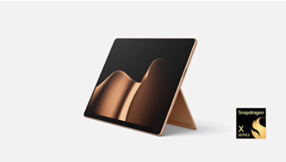 A Surface Pro 13-inch 12ed in the color Dune with a Snapdragon badge.