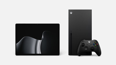 A platinum Surface Laptop 7 with Copilot and Xbox Series X in black and 1 terabyte storage. 