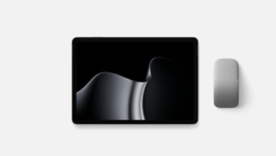A top-down view of a Surface Pro, 12-inch (2nd Edition) and a Surface Arc Mouse. 