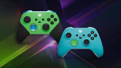 A green XBOX controller and a teal XBOX controller from the XBOX Design Lab.