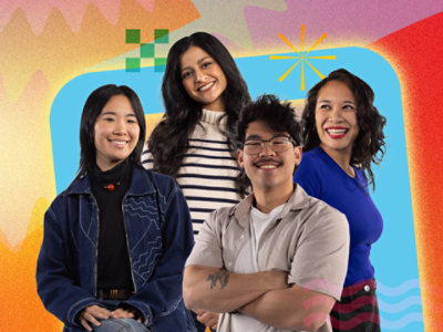  Four people standing together, smiling, against a colorful background.