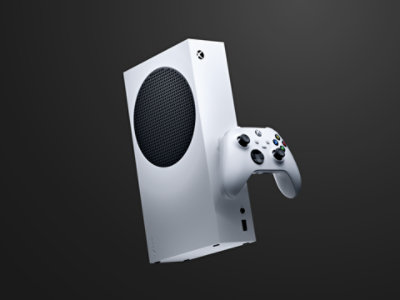 A white Xbox Series S with a wireless controller.