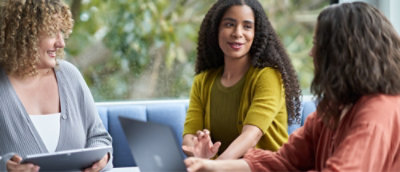 A group of people talking with each other