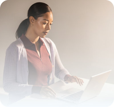 A person using a laptop.