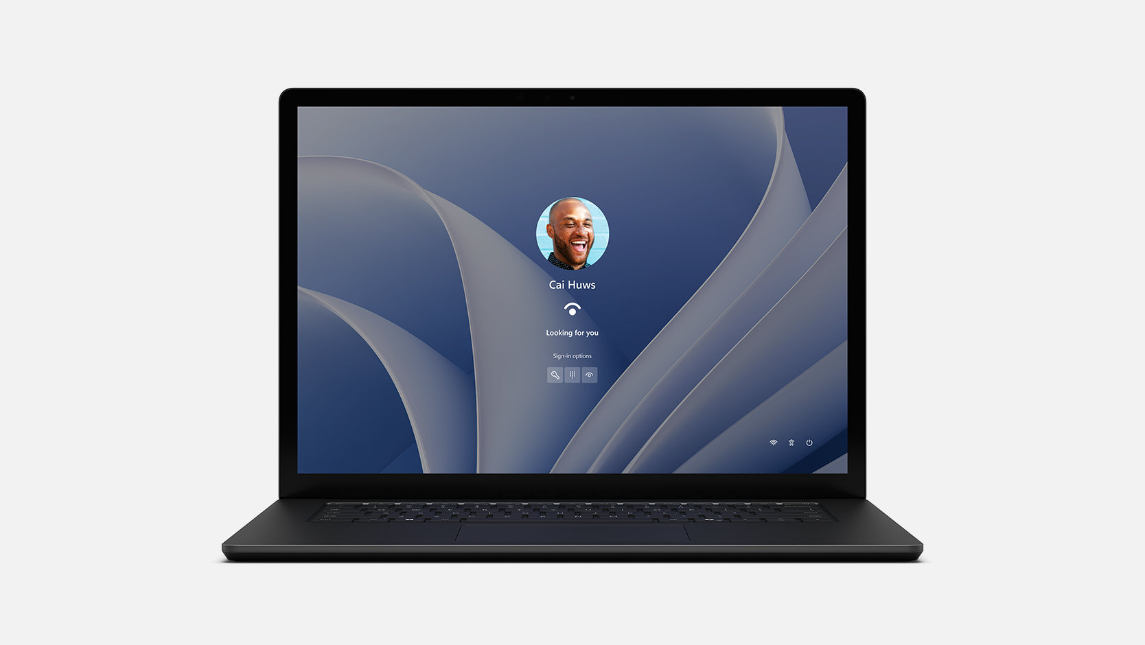 Un dispositivo Surface Laptop 6 para empresas muestra en su pantalla que se abre Windows Hello.