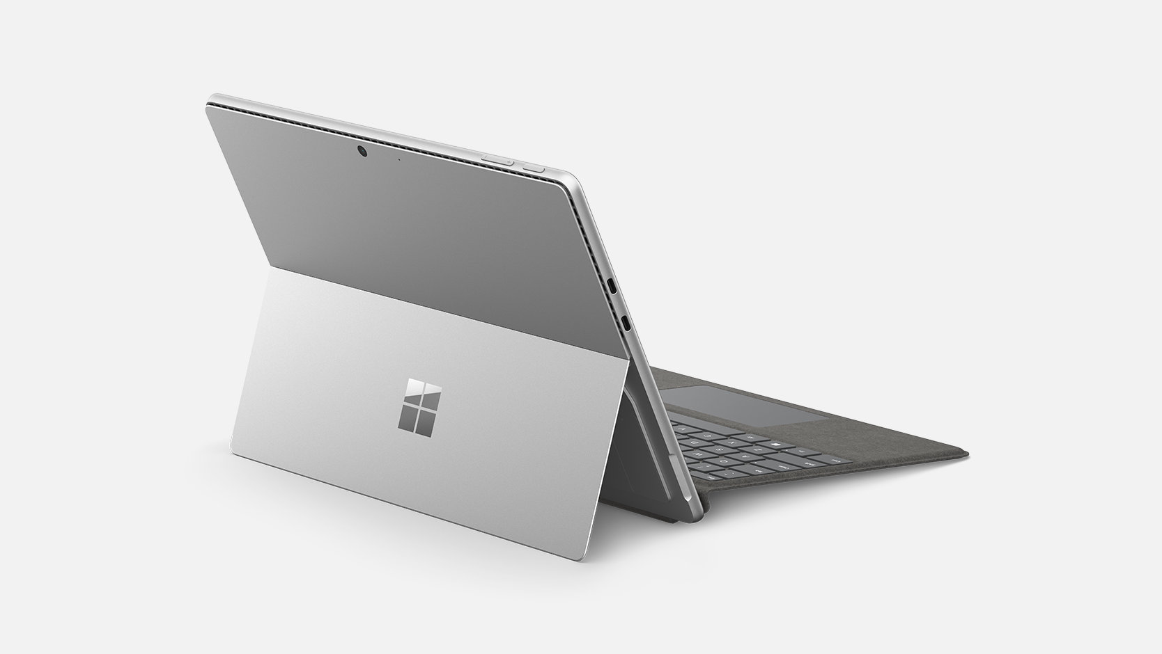 A Surface device is attached to a Surface Pro Keyboard for Business, showing the Alcantara® material.