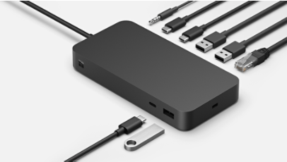 The various ports of a Surface Thunderbolt 4 Dock for Business surrounded by various connective cables.