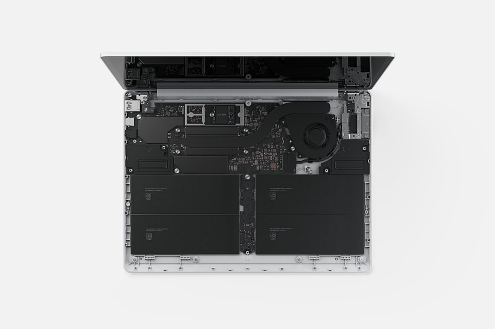 Een bovenaanzicht van de interne thermische componenten van Surface Laptop Go 2 voor zakelijk gebruik.