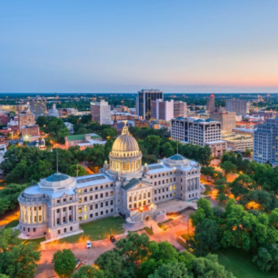State capitol building and city skyline.