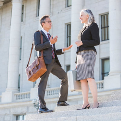 A man and a woman standing and having a discussion