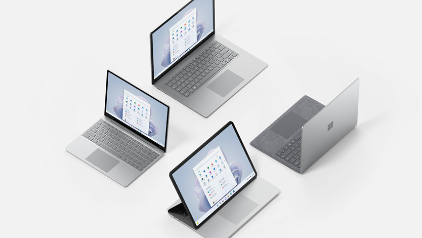 A collection of different Surface Laptop devices in platinum