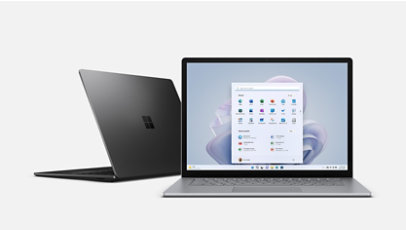 A Platinum 15 inch Surface Laptop 5 next to a Black 13.5 inch Surface Laptop 5.