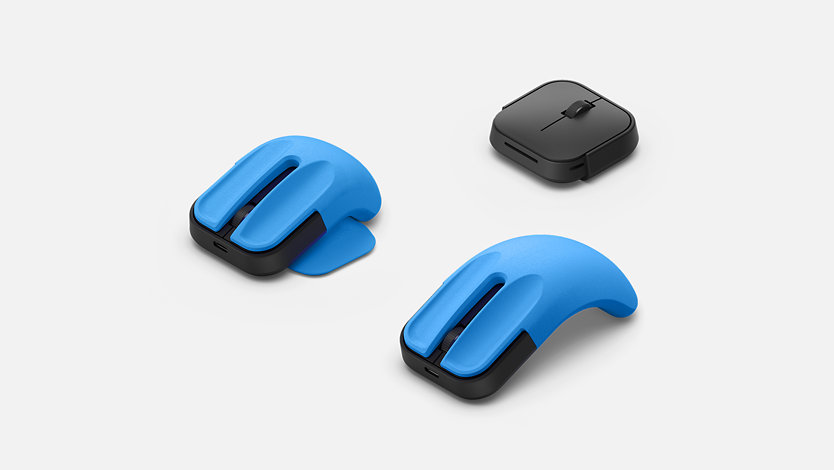 Mouse adattivo Microsoft con due diversi accessori stampati in 3D. 