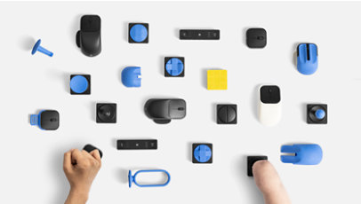 Various Microsoft Adaptive Accessories for Business, such as the Microsoft Adaptive Hub and the Microsoft Adaptive Mouse.
