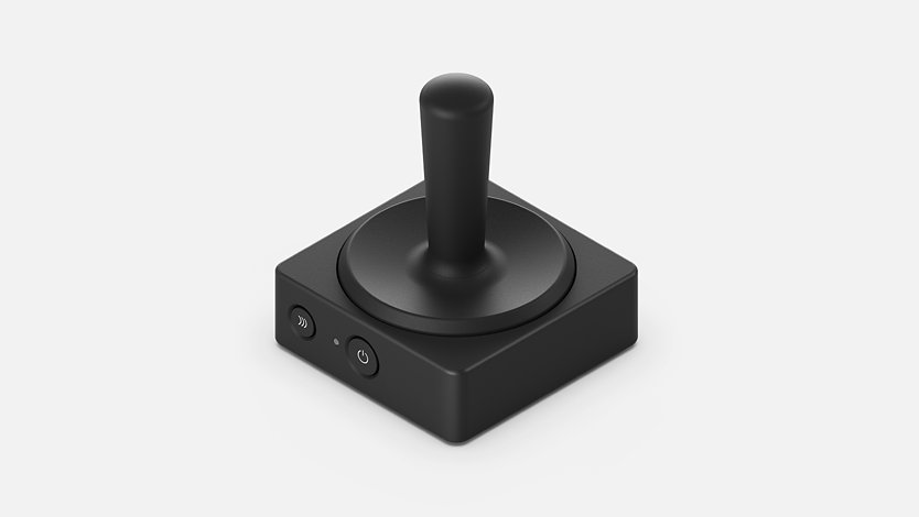 Vue en angle du bouton du joystick adaptatif de Microsoft.