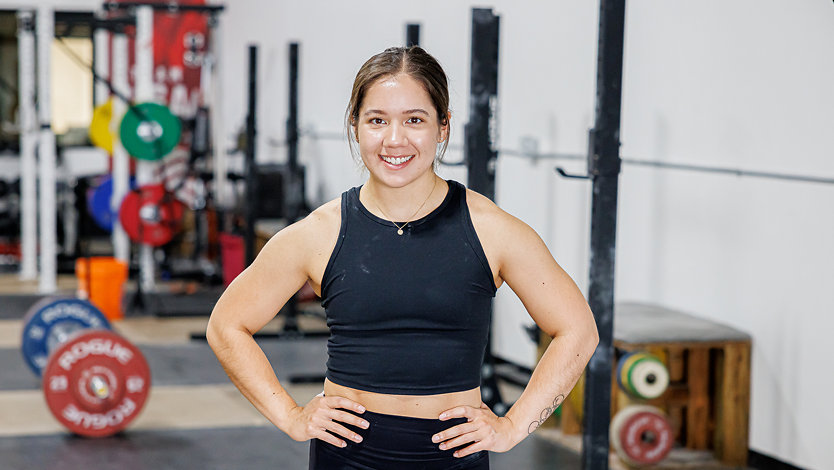 Worldclass weightlifter, Jourdan Delacruz, looks powerful and confident.