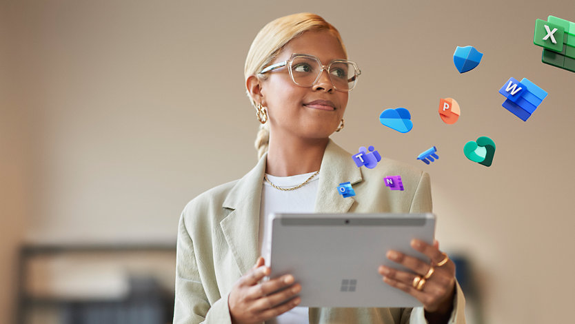 Lady holding Surface Pro with Microsoft 365 Icons toss