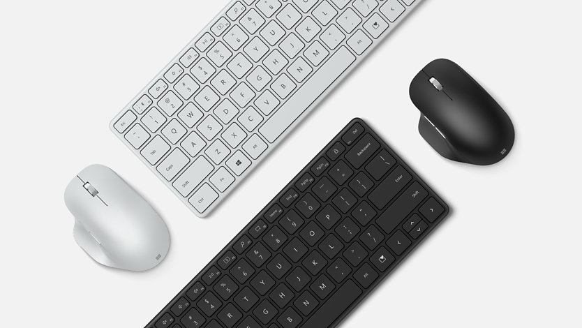Souris ergonomique et clavier compact Microsoft Designer en noir et glacier.