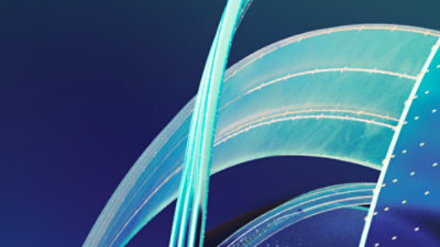 Ribbons in blue, teal, and light blue flow in textured layers.