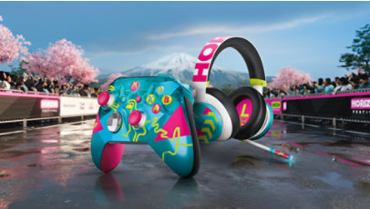 富士山を背景にしたレース トラックに配置された、Forza Horizon 6 限定エディションのデザインの Xbox ワイヤレス コントローラーと Xbox ヘッドセット。