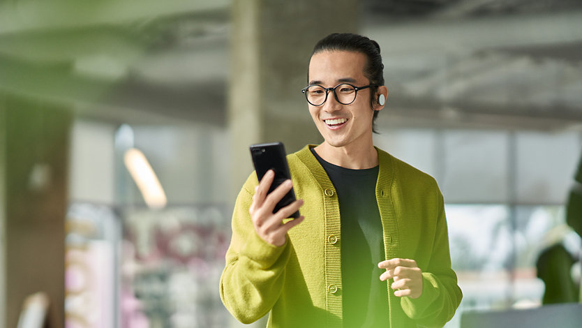 A worker checking email