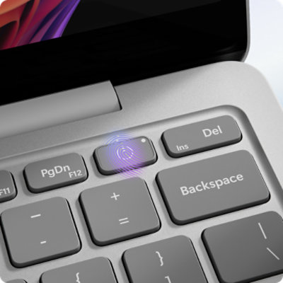 A close-up view of a Fingerprint Power Button on the keyboard of a Surface Laptop for Business.